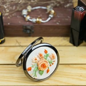 Hand embroidered pocket mirror